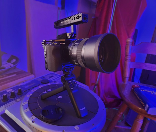Sony Alpha ZV-E1 perched on an old Roland electronic hand drum.<br>I had not yet realized that the top handle was undesirable.<br>The Sony shotgun microphone had not arrived yet.